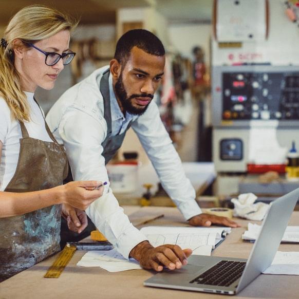 A photo of a entrepreneurs working in a small business environment.